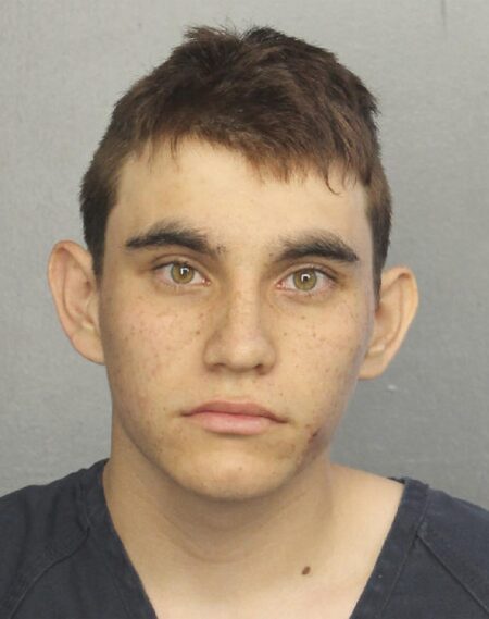 School Shooting Suspect Slipped Past Security via Unsecured Door, Police Say – The New York Times
