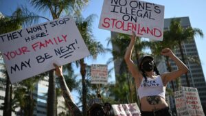 PHOTOS: Protests against immigration raids spread across the U.S. – PBS