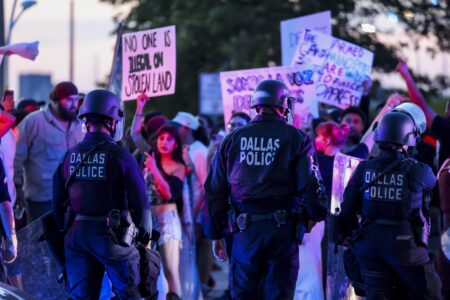Protestors gathered outside the U.S. Immigration and Customs Enforcement center in Dallas to protest – Dallas News