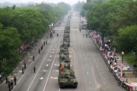 Military parade rolls through DC as ‘No Kings’ protesters across US decry Trump – Dallas News